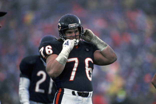 CHICAGO - DECEMBER 30:  Steve McMichael #76 of the Chicago Bears removes his helmet during the game against the Kansas City Chiefs on December 30, 1990 in Chicago, Illinois. The Chiefs won 21-10. 